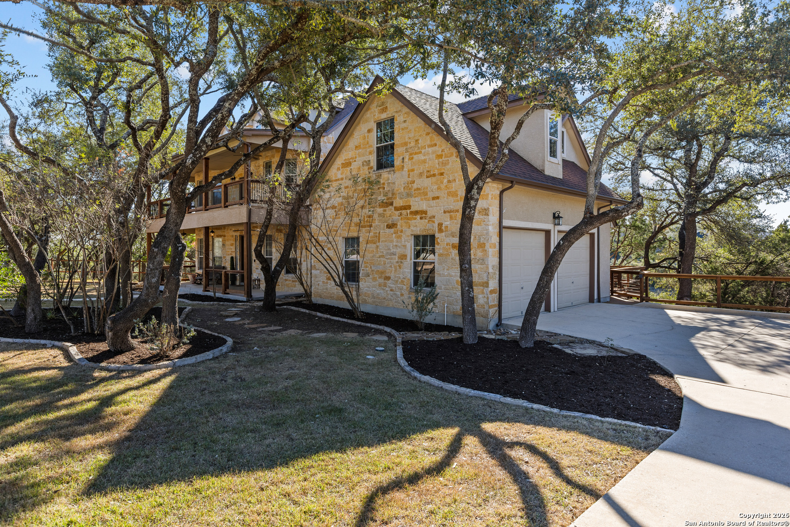 250 Misty Brook Spring Branch, TX 78070 - Photo 4 of 47 a front view of a house with a yard
