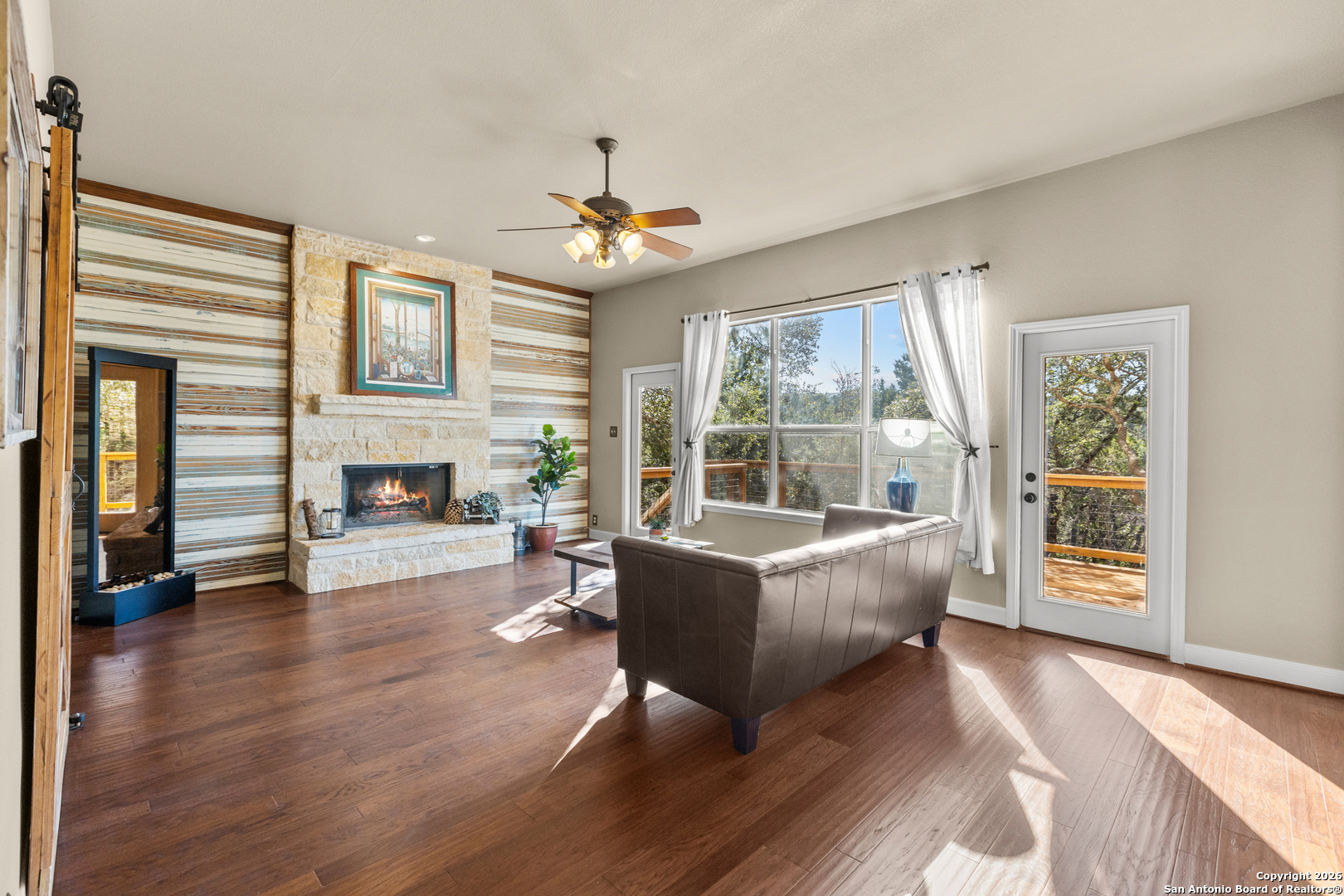 250 Misty Brook Spring Branch, TX 78070 - Photo 10 of 47 a living room with furniture and a fireplace