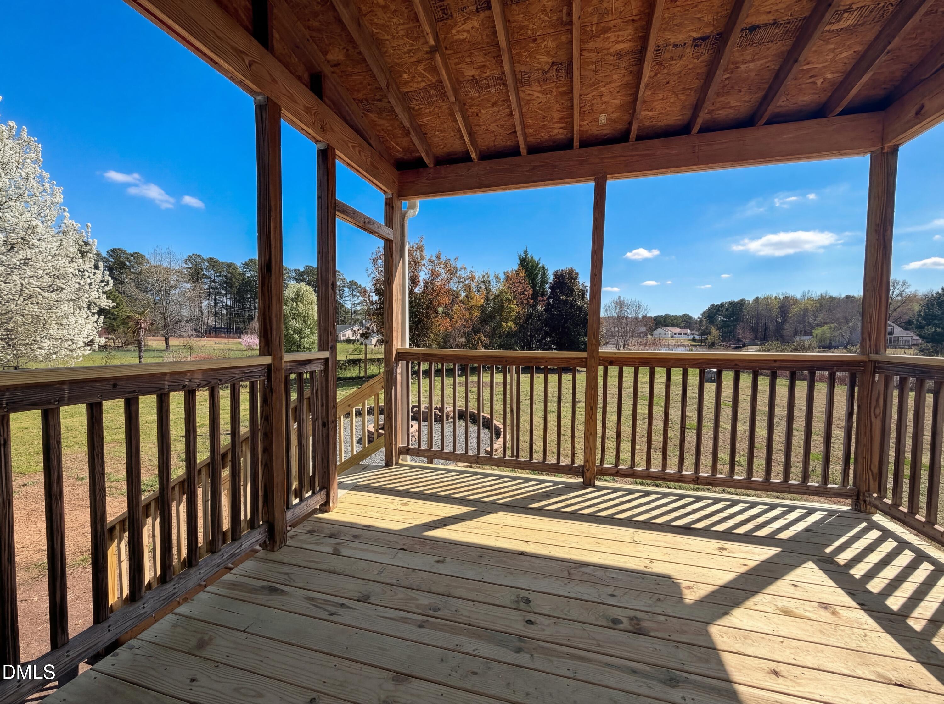 1071 Darius Pearce Road Youngsville, NC 27596 - Photo 17 of 22 a view of balcony with wooden floor