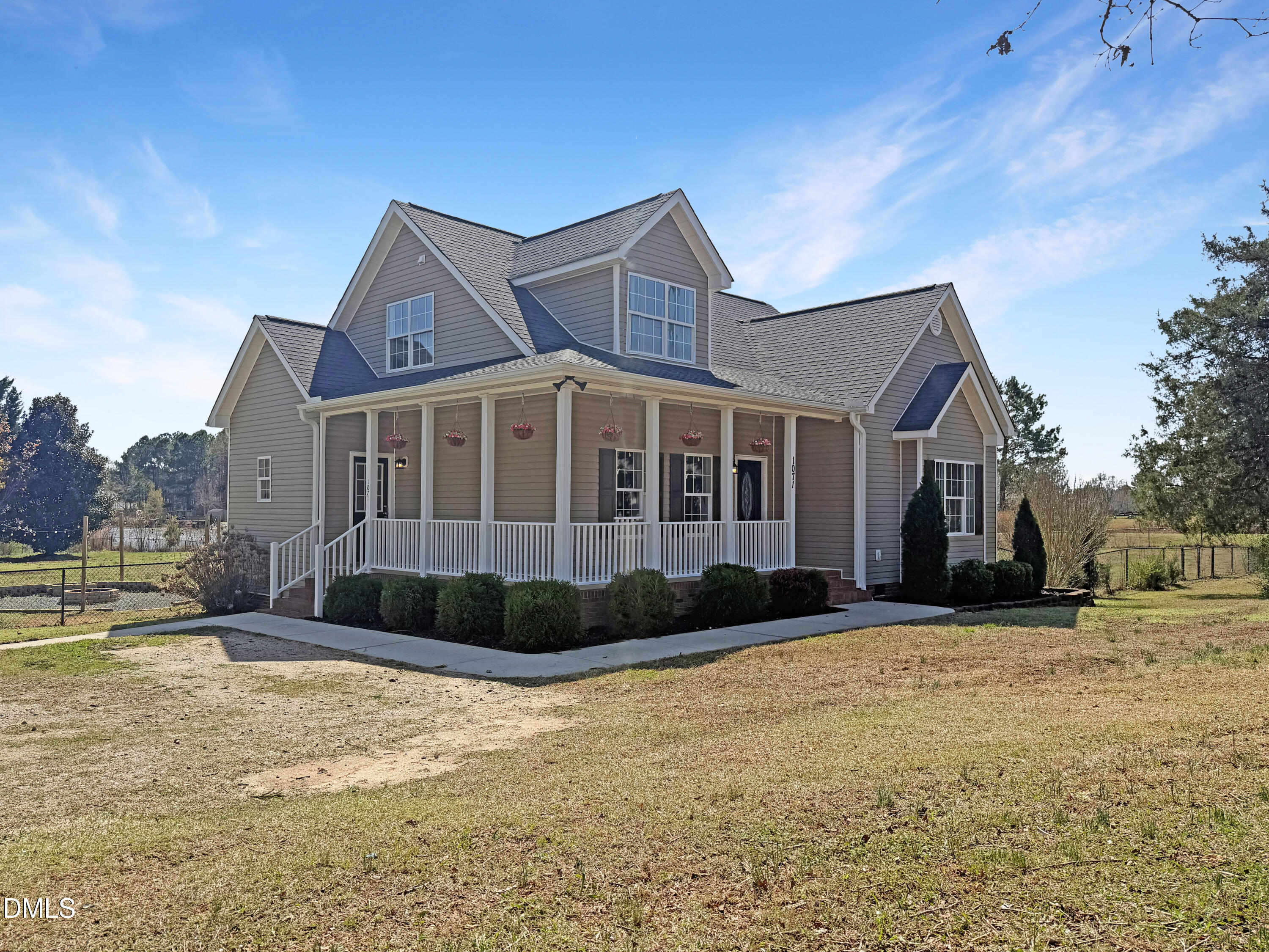 1071 Darius Pearce Road Youngsville, NC 27596 - Photo 19 of 22 a front view of a house with a yard