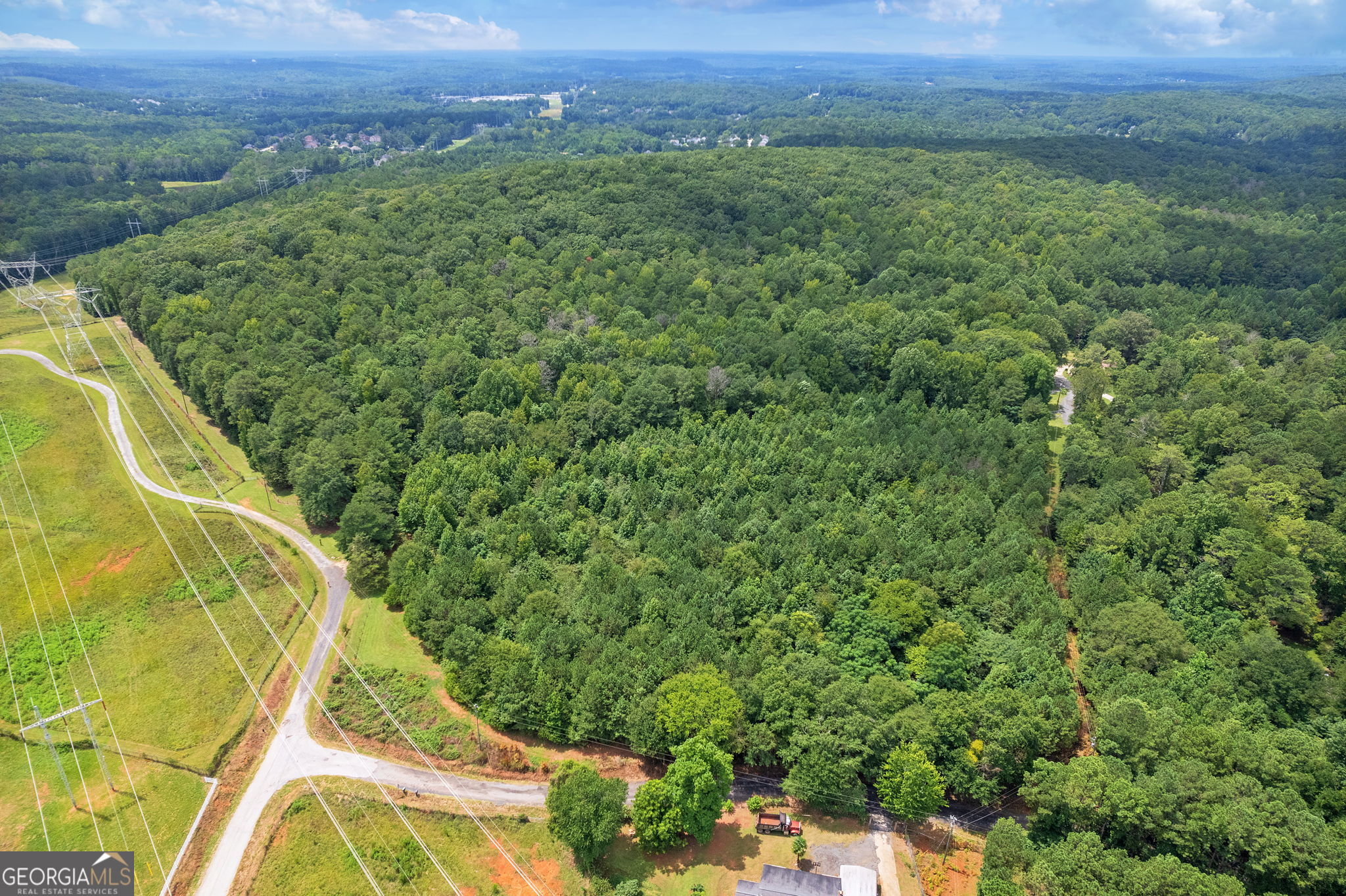 7201 Browns Mill Road Lithonia, GA 30038 - Photo 21 of 29 a view of a field with a field and trees