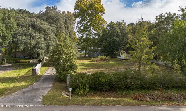 a view of a street with a trees