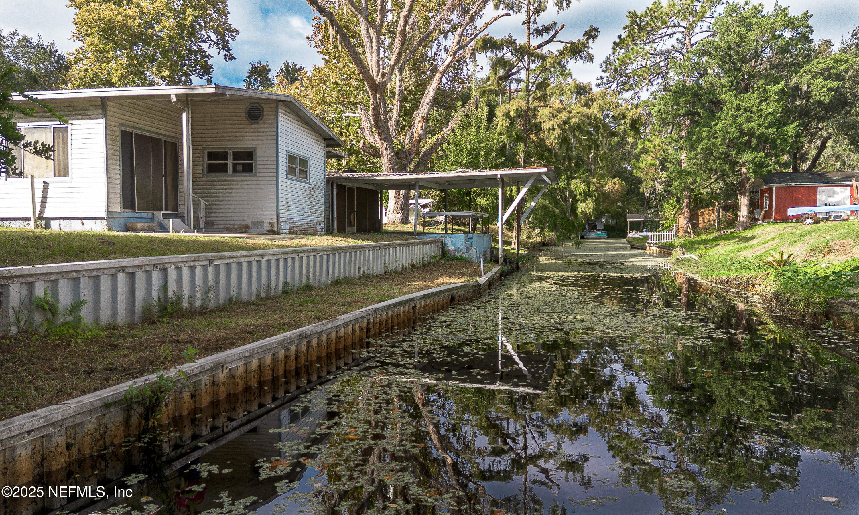 590 Palmetto Bluff Road Palatka, FL 32177 - Photo 10 of 13 a view of a house with a yard