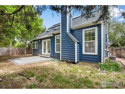 a kitchen with a sink cabinets and refrigerator