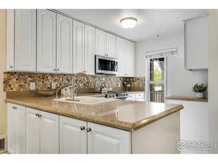 a view of living room with granite countertop furniture
