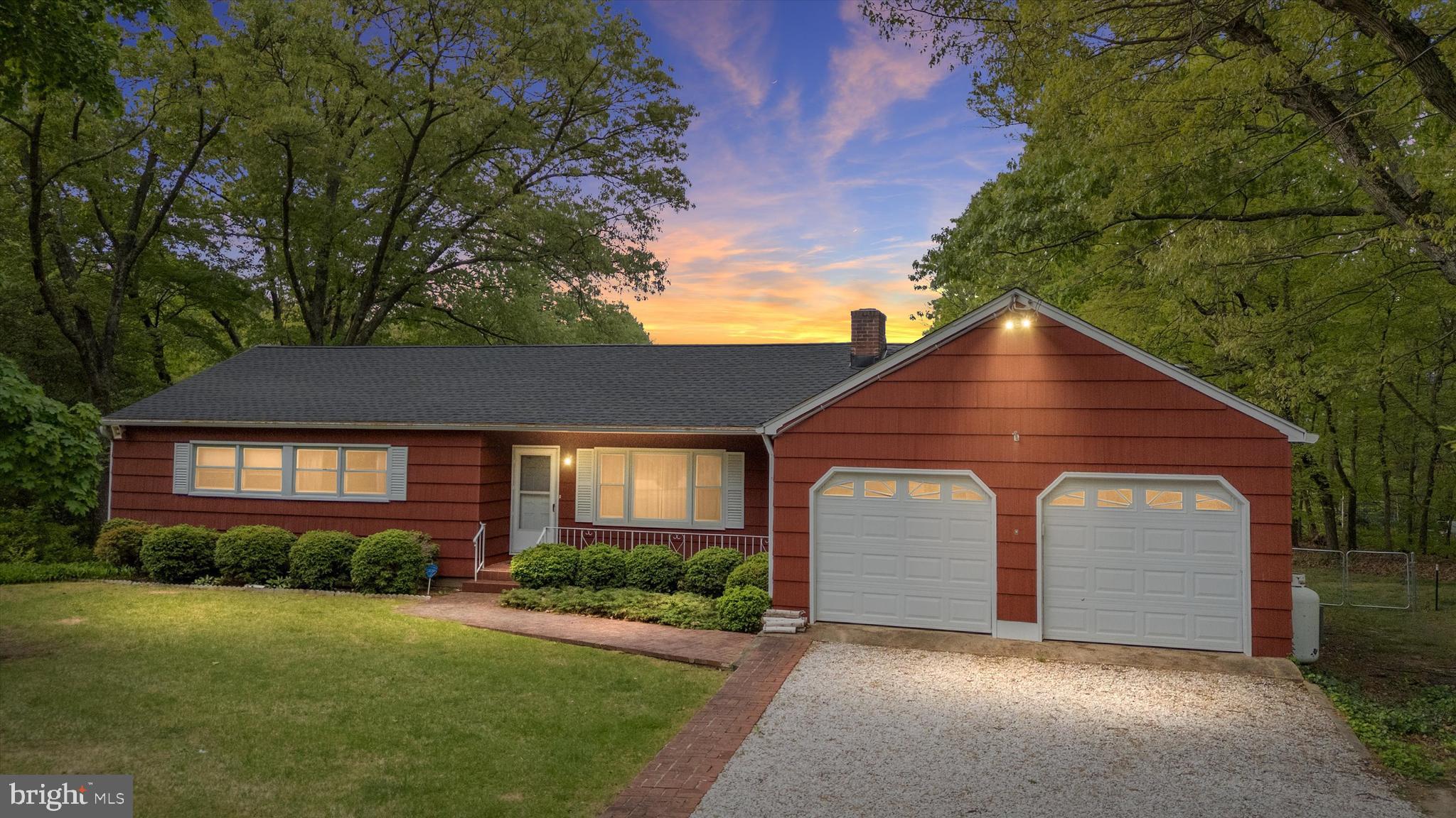 1159 Dicus Mill Road Millersville, MD 21108 - Photo 1 of 81 a front view of a house with a yard and garage