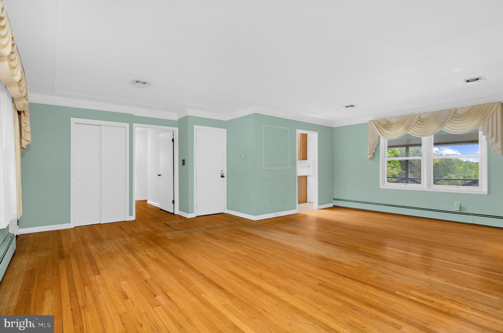 1159 Dicus Mill Road Millersville, MD 21108 - Photo 13 of 81 a bedroom with a bed and a window