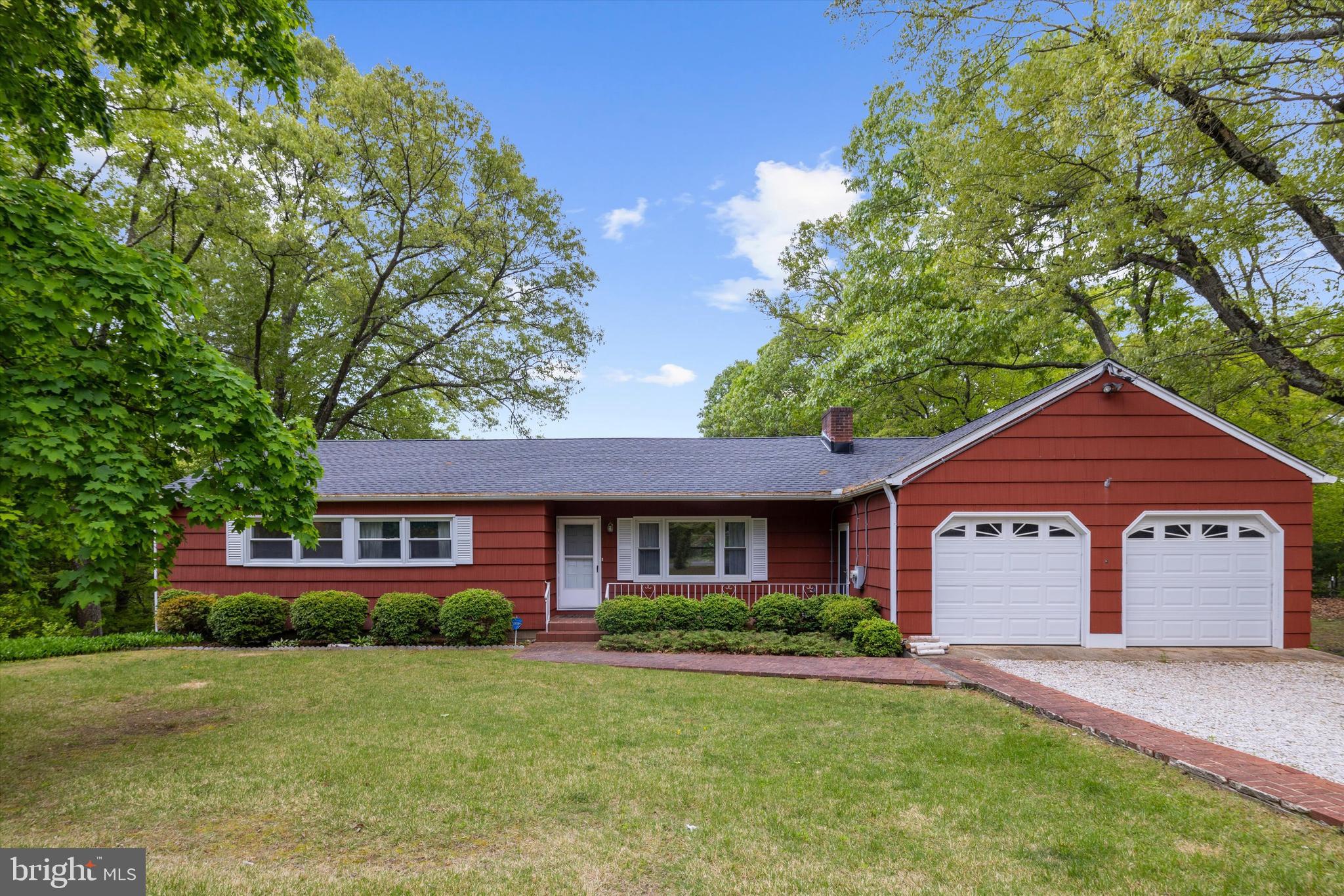 1159 Dicus Mill Road Millersville, MD 21108 - Photo 2 of 81 a view of a yard in front of a house with large windows