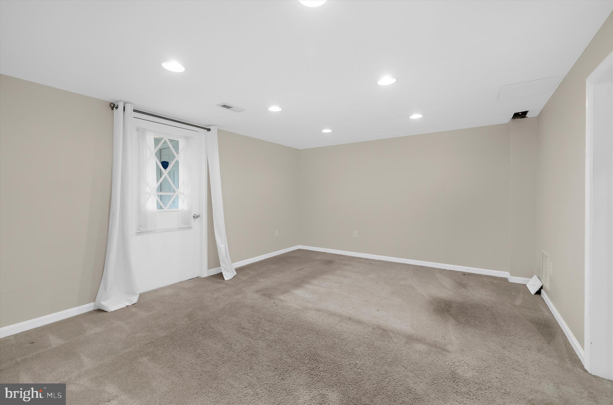 1159 Dicus Mill Road Millersville, MD 21108 - Photo 38 of 81 an empty room with closet and mirror