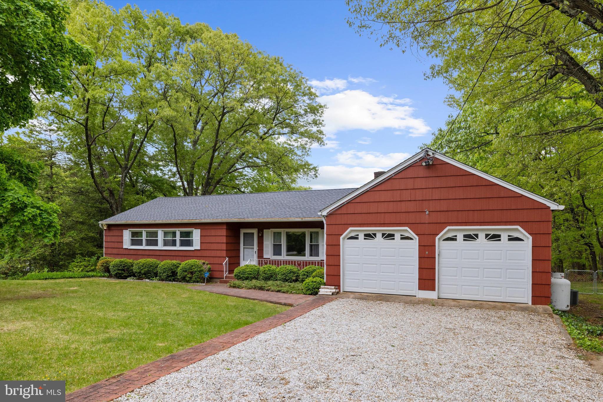 1159 Dicus Mill Road Millersville, MD 21108 - Photo 4 of 81 a front view of a house with a garden