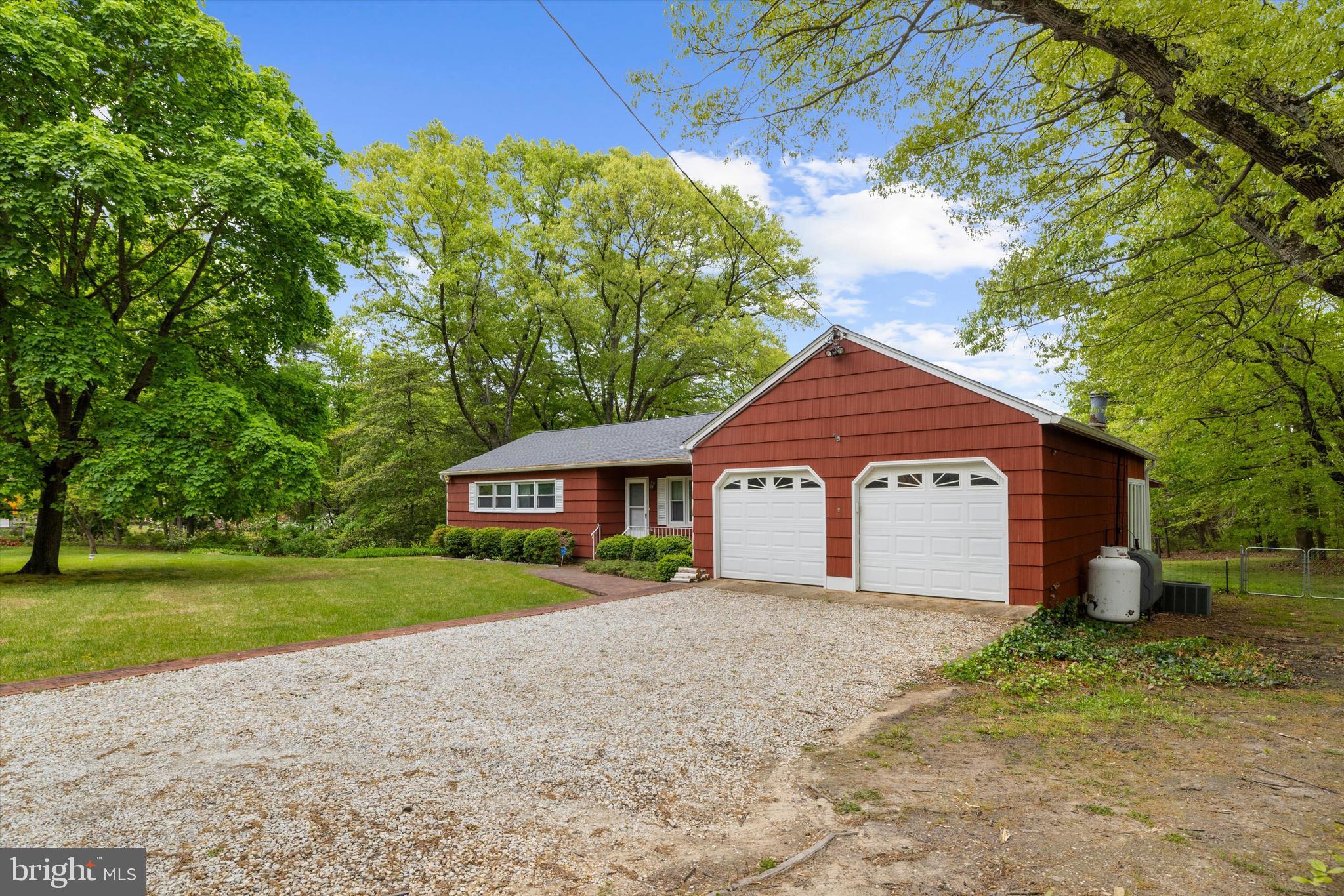 1159 Dicus Mill Road Millersville, MD 21108 - Photo 5 of 81 a view of a house with a yard and large tree