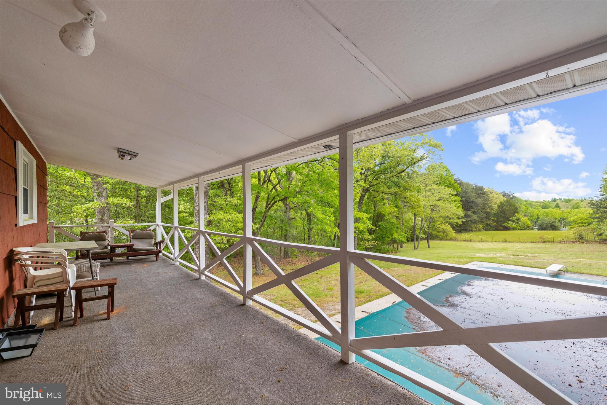 1159 Dicus Mill Road Millersville, MD 21108 - Photo 57 of 81 a view of a room with furniture and a backyard
