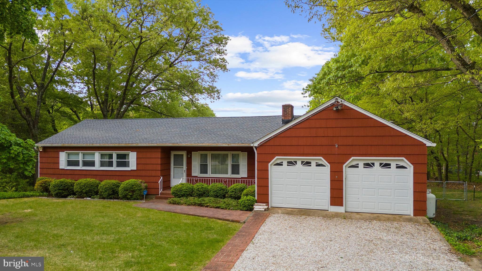 1159 Dicus Mill Road Millersville, MD 21108 - Photo 6 of 81 a front view of a house with a yard and garage