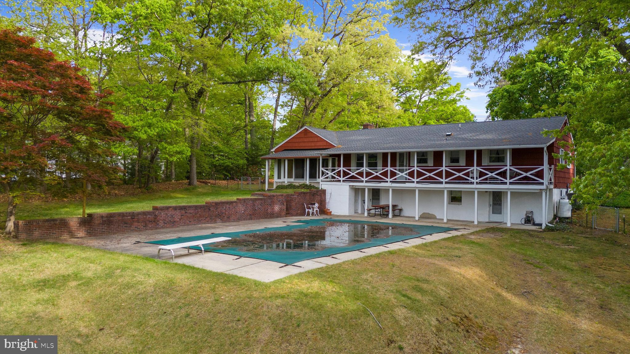 1159 Dicus Mill Road Millersville, MD 21108 - Photo 68 of 81 a view of a house with a swimming pool
