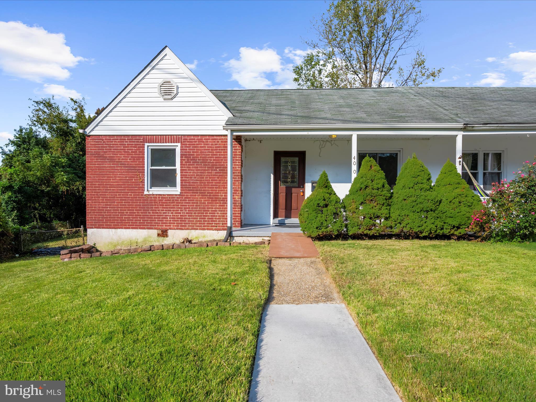 400 Dale Avenue Baltimore, MD 21206 - Photo 1 of 27 front view of a house with a yard