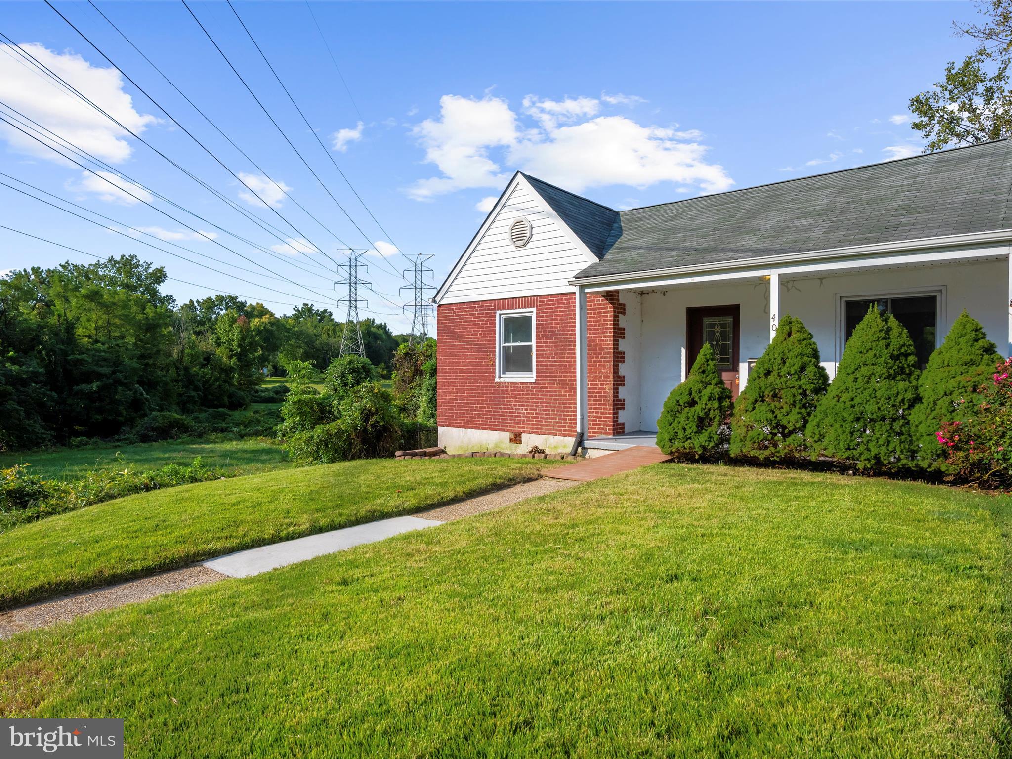 400 Dale Avenue Baltimore, MD 21206 - Photo 2 of 27 a view of a house with a yard and potted plants