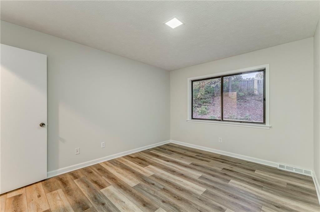 10 Thornwood Drive Southwest Rome, GA 30165 - Photo 45 of 57 a view of an empty room with a window