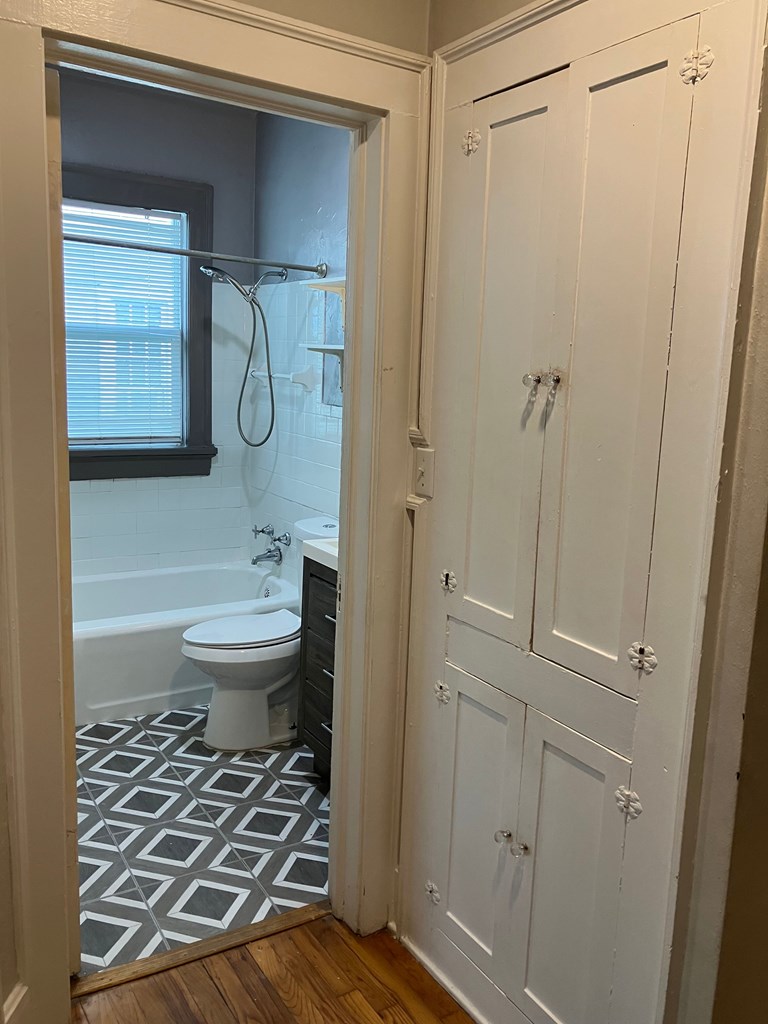 2318 Huggins Street Columbus, GA 31903 - Photo 12 of 40 a bathroom with a toilet and a shower
