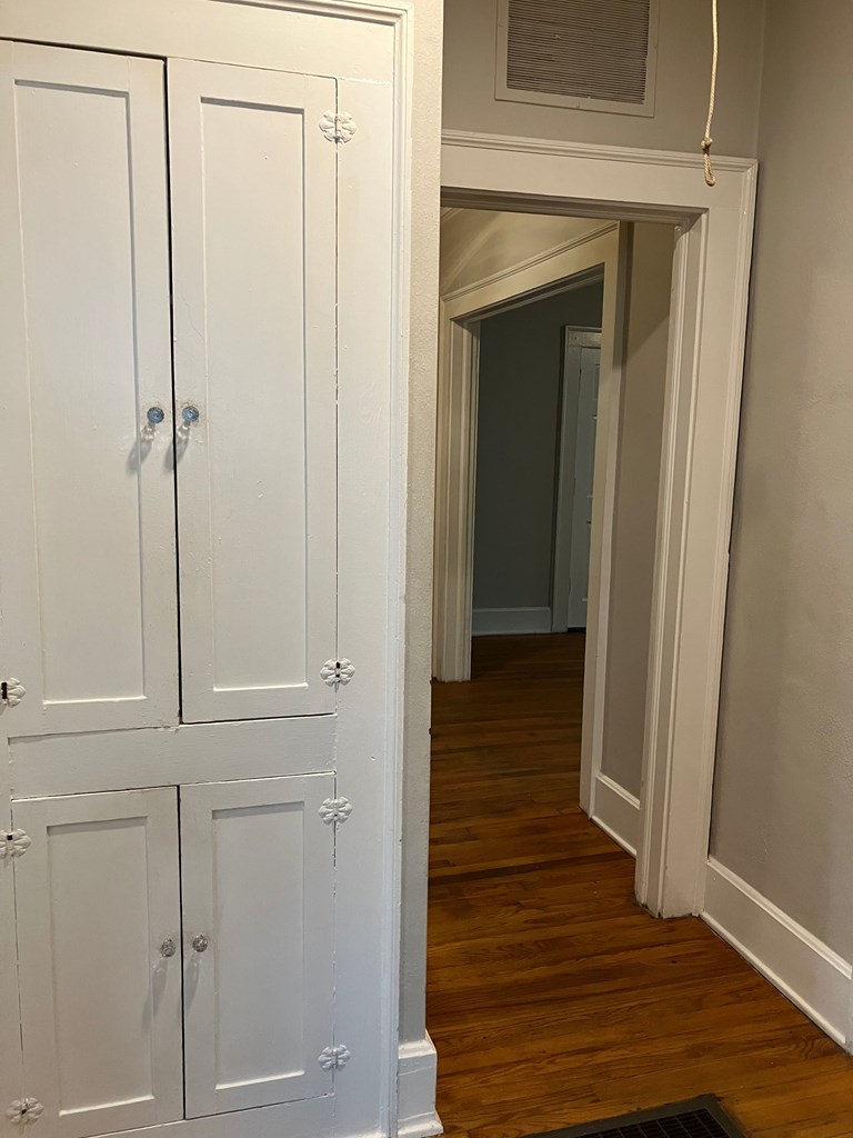 2318 Huggins Street Columbus, GA 31903 - Photo 16 of 40 a view of a hallway with wooden floor