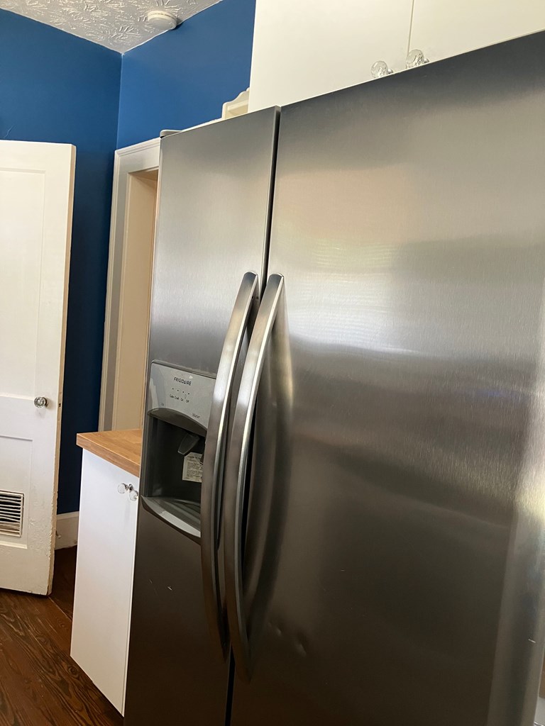 2318 Huggins Street Columbus, GA 31903 - Photo 27 of 40 a metallic refrigerator freezer sitting in a kitchen