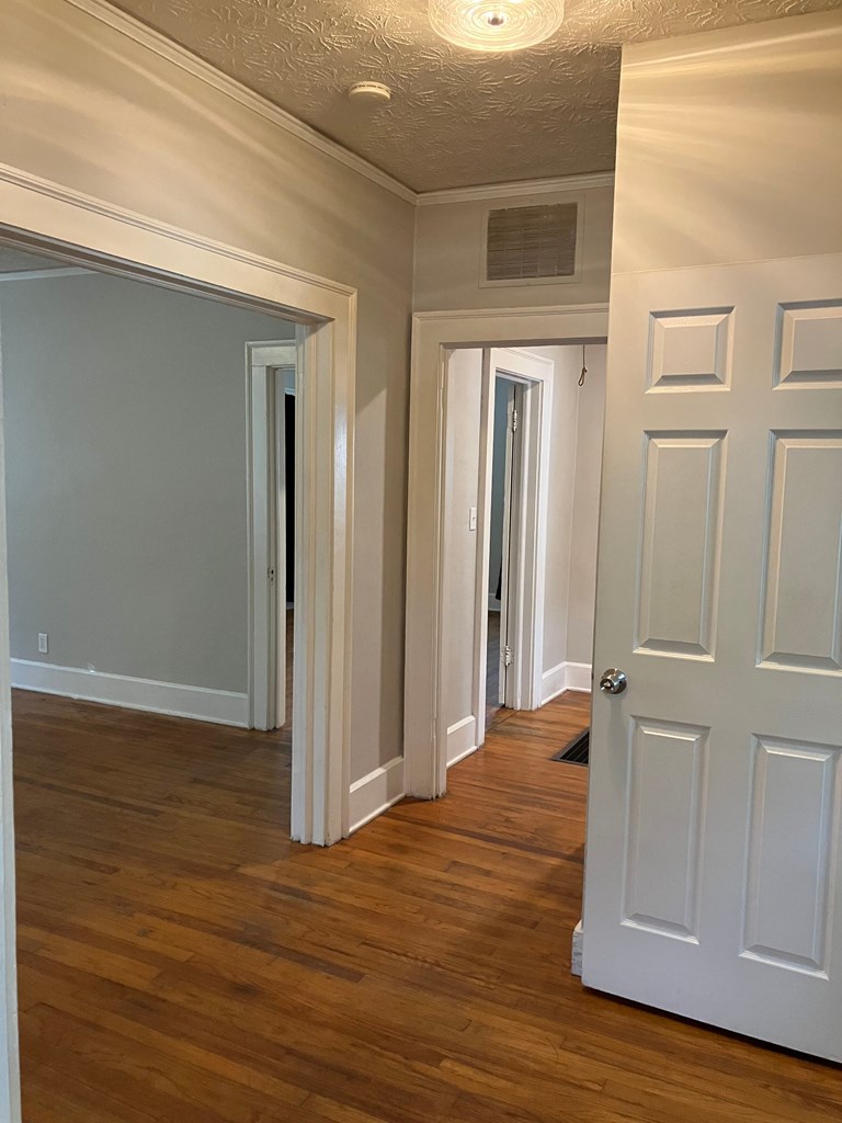 2318 Huggins Street Columbus, GA 31903 - Photo 35 of 40 a view of a room with wooden floor and cabinet