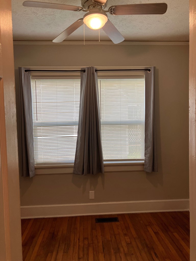 2318 Huggins Street Columbus, GA 31903 - Photo 36 of 40 a view of a room with wooden floor and a window