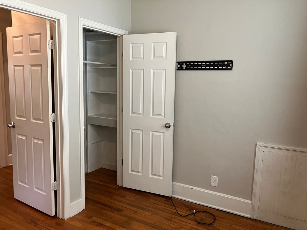 2318 Huggins Street Columbus, GA 31903 - Photo 38 of 40 an empty room with wooden floor & closet area