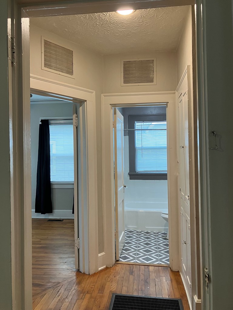 2318 Huggins Street Columbus, GA 31903 - Photo 7 of 40 a view of hallway with wooden floor