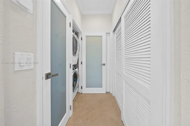 a view of a hallway with a white door