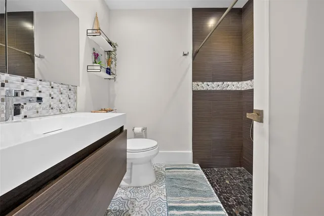 a bathroom with a sink and a toilet