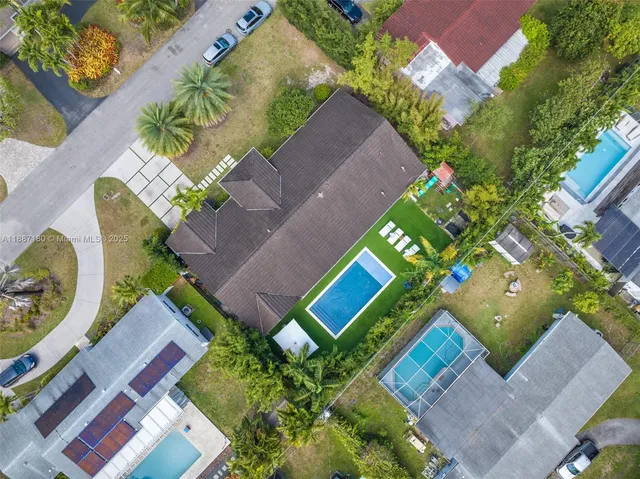 front view of a house with a fountain