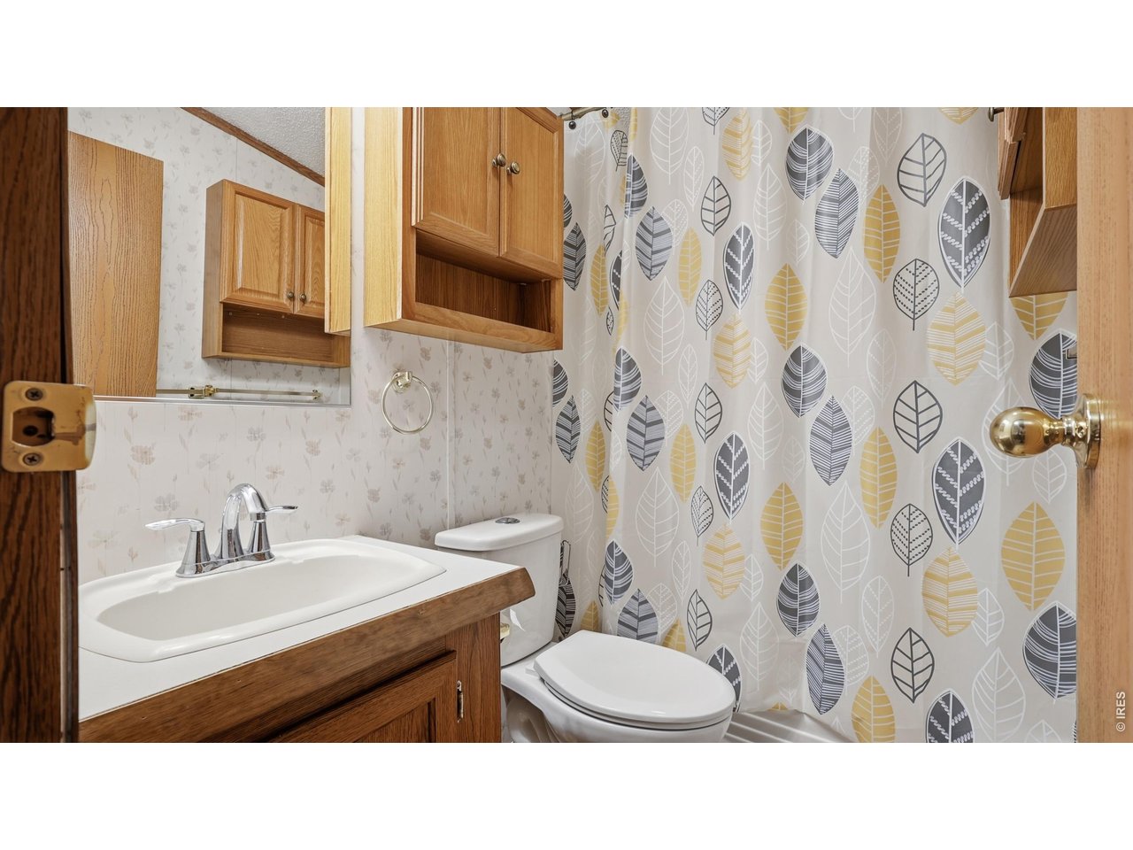 256 Navajo Road Weldona, CO 80653 - Photo 15 of 27 a bathroom with a sink toilet and shower