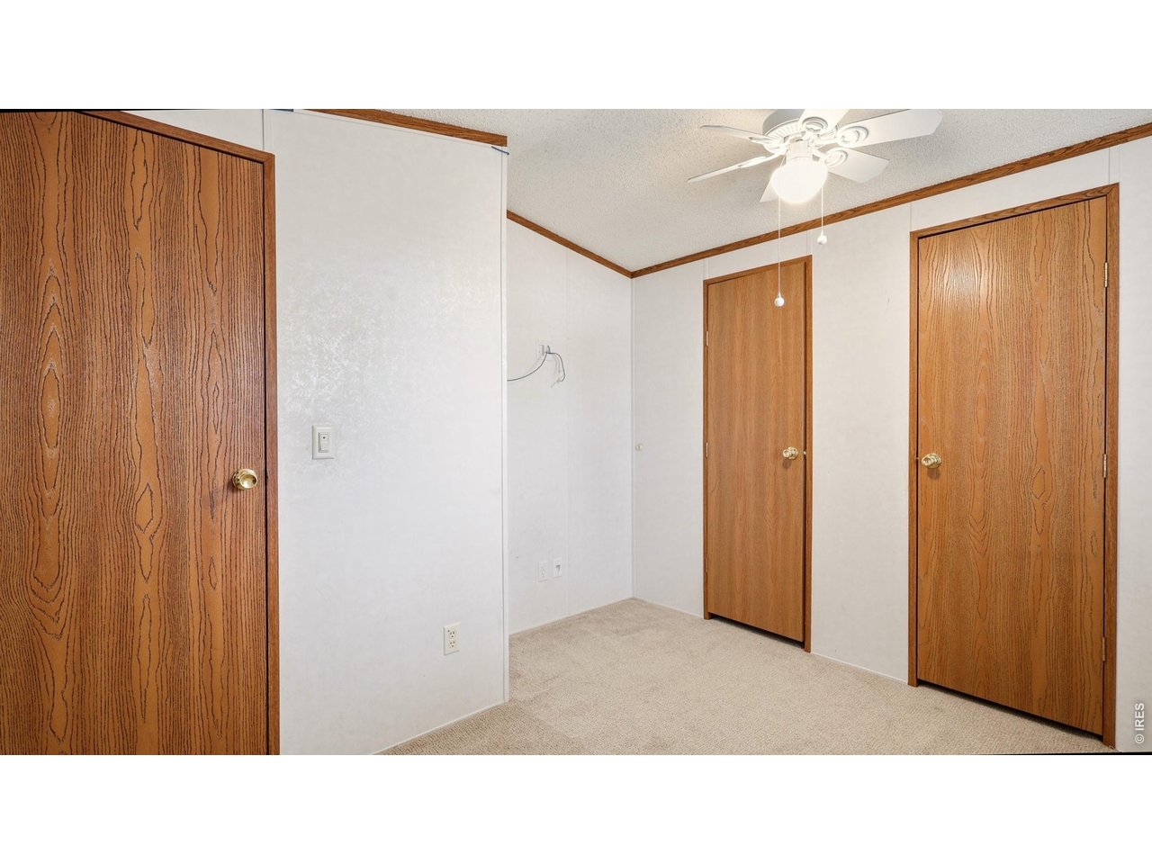 256 Navajo Road Weldona, CO 80653 - Photo 17 of 27 a bathroom with a sink and a mirror