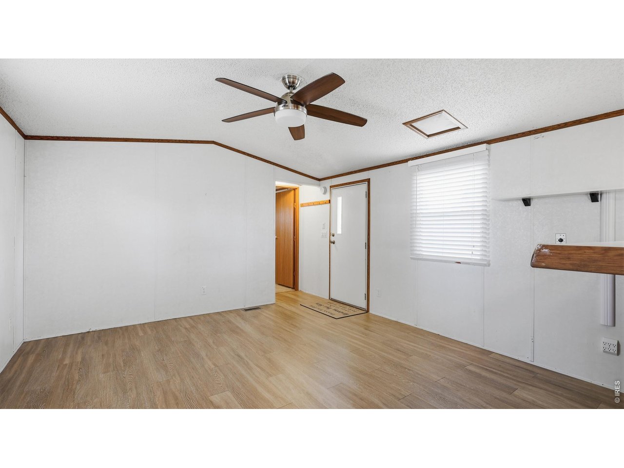 256 Navajo Road Weldona, CO 80653 - Photo 10 of 27 a black and white photo of a room