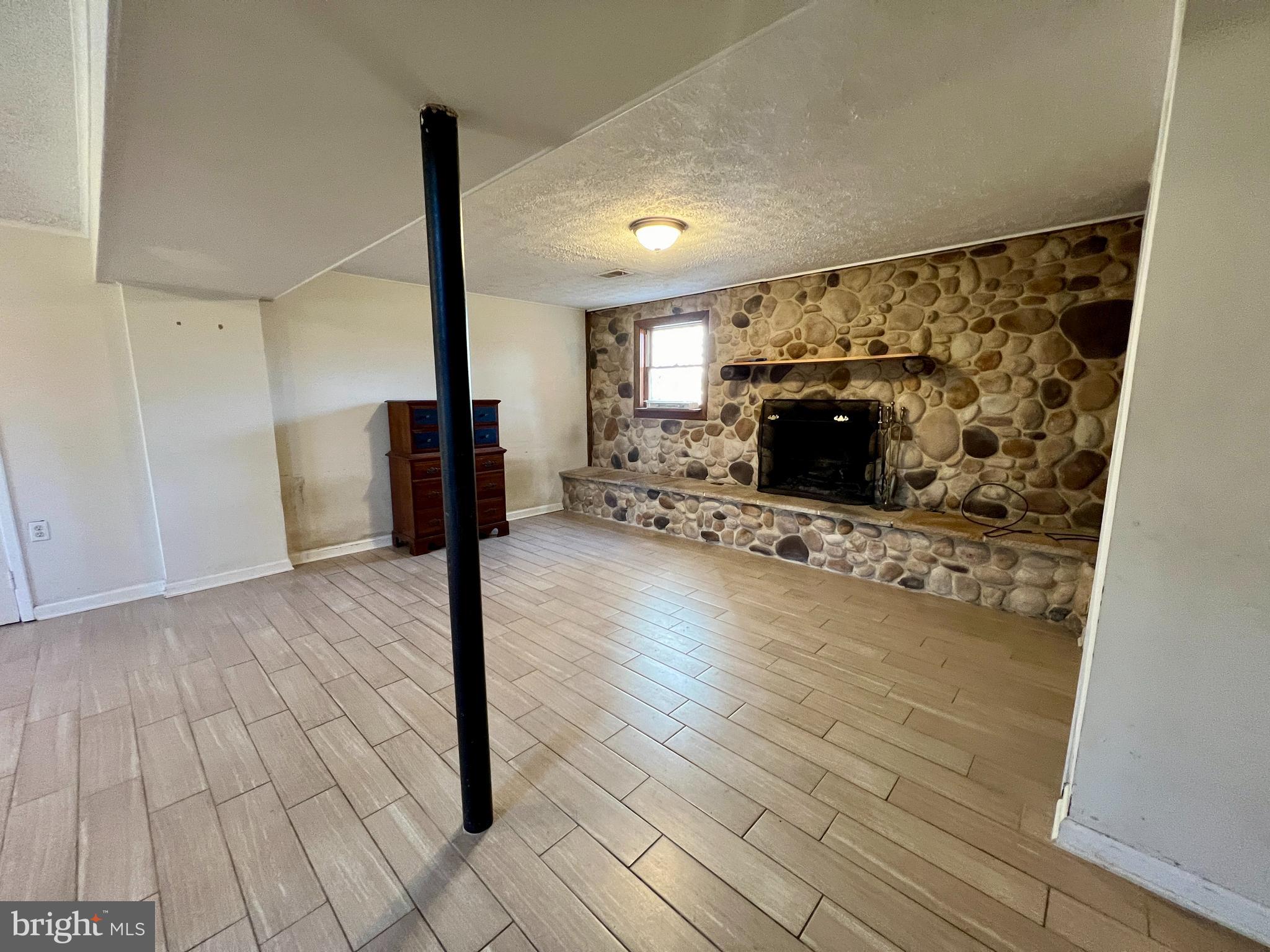 3027 Marlin Drive Riva, MD 21140 - Photo 23 of 36 Bright Rec Room with Wood Burning FP