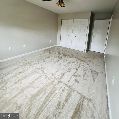 a view of a room with an empty space