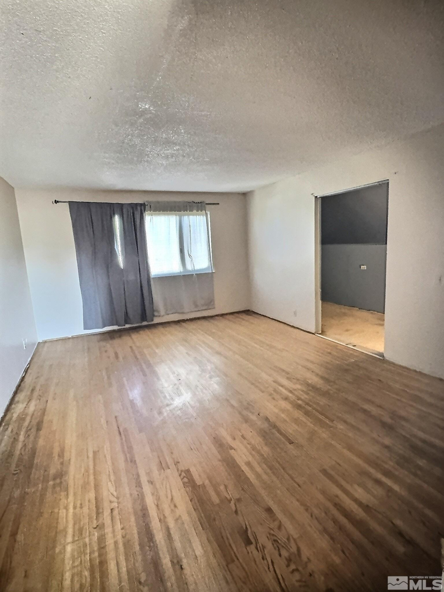 1201 Silverada Boulevard Reno, NV 89512 - Photo 6 of 16 a view of an empty room and window