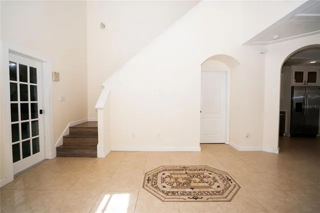 an entryway view with staircase