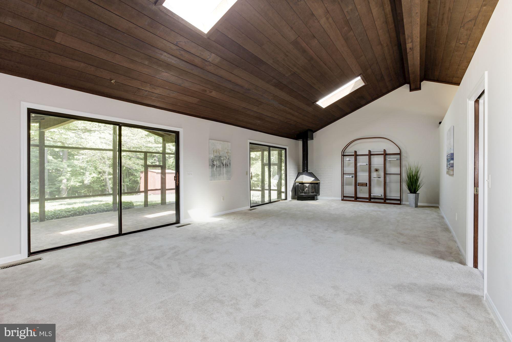 1666 Winchester Road Annapolis, MD 21409 - Photo 11 of 25 Living Room/Dining Room Area with vaulted ceilings
