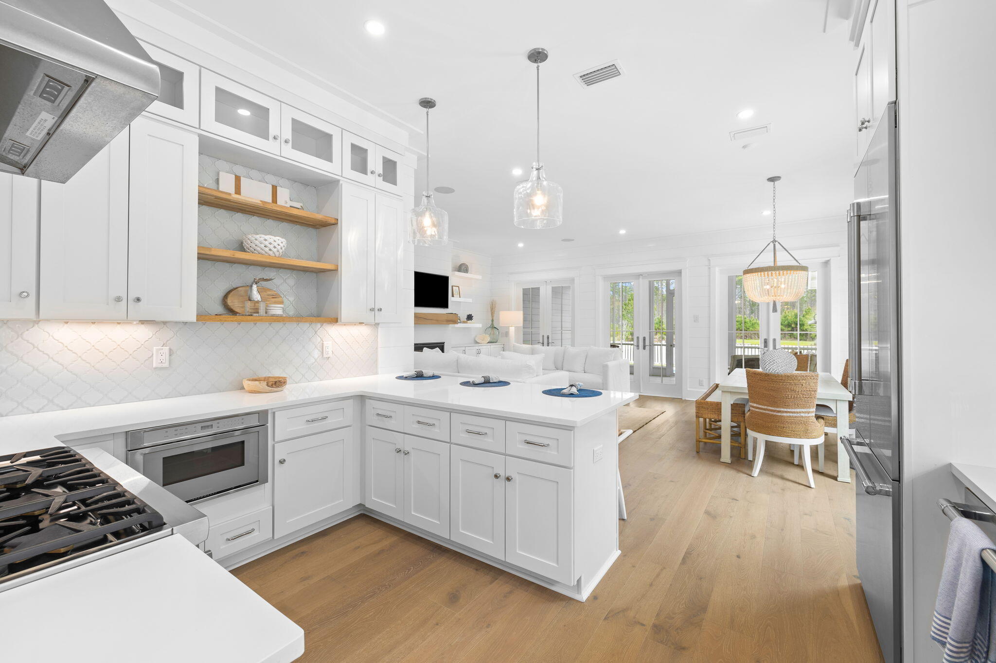 41 Seastone Ct Inlet Beach Inlet Beach, FL 32461 - Photo 13 of 52 a kitchen with a sink stove and cabinets