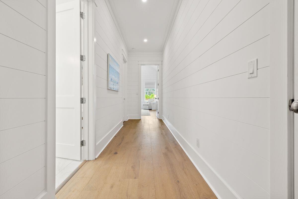 41 Seastone Ct Inlet Beach Inlet Beach, FL 32461 - Photo 20 of 52 a view of a hallway with wooden floor