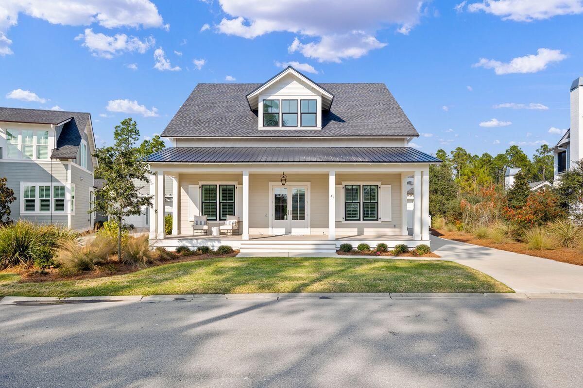 41 Seastone Ct Inlet Beach Inlet Beach, FL 32461 - Photo 3 of 52 front view of a house with a yard