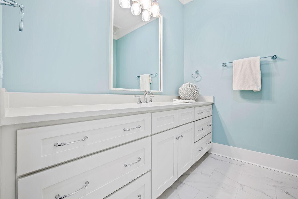 41 Seastone Ct Inlet Beach Inlet Beach, FL 32461 - Photo 36 of 52 a bathroom with a sink and a mirror