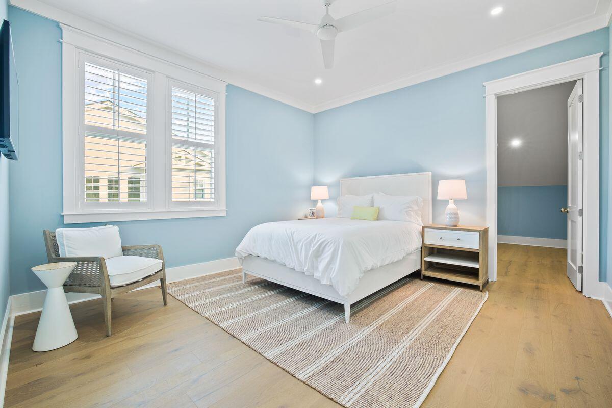 41 Seastone Ct Inlet Beach Inlet Beach, FL 32461 - Photo 37 of 52 a bedroom with a bed and a chair