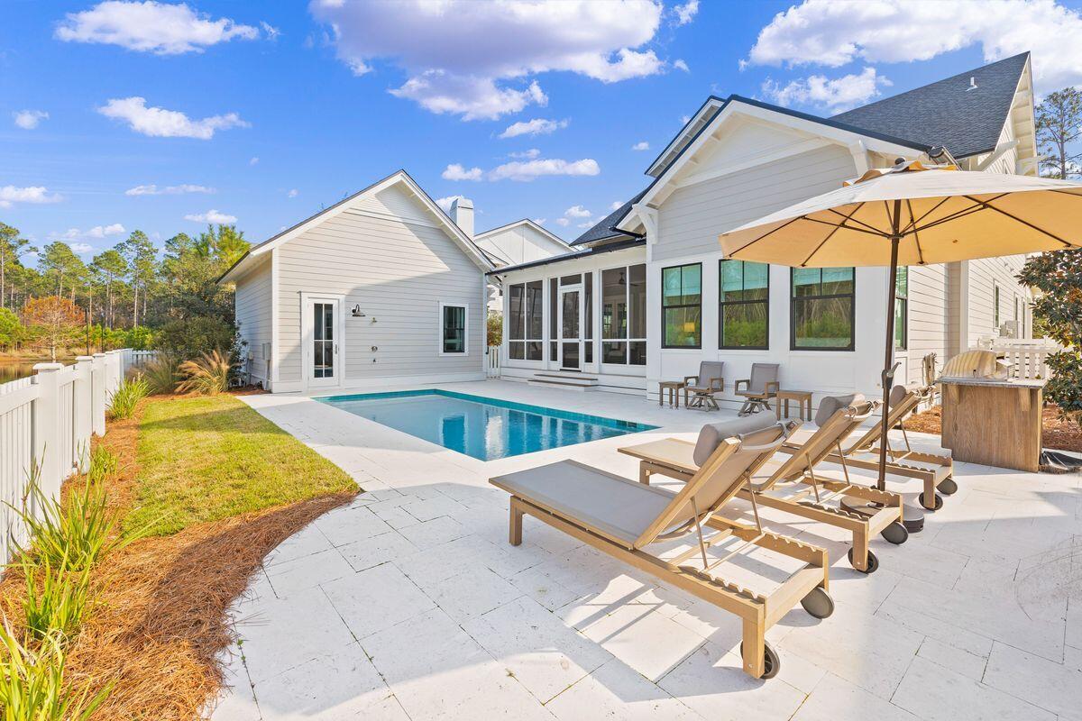 41 Seastone Ct Inlet Beach Inlet Beach, FL 32461 - Photo 40 of 52 a view of a house with swimming pool and sitting area