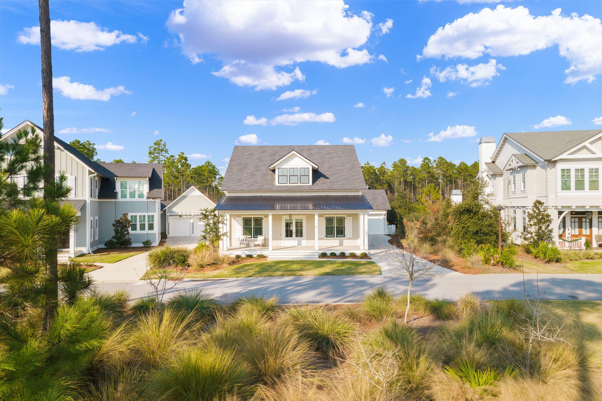 41 Seastone Ct Inlet Beach Inlet Beach, FL 32461 - Photo 52 of 52 a front view of a house with a yard