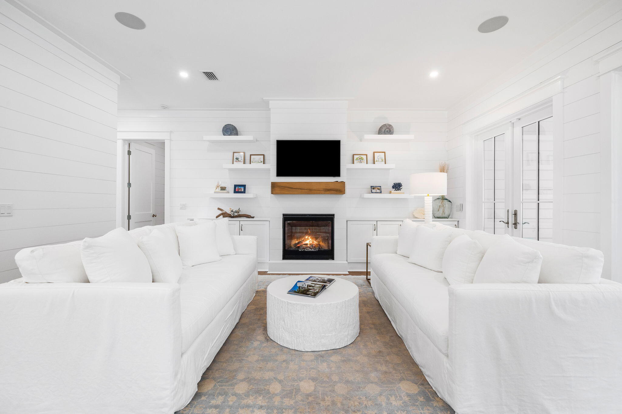 41 Seastone Ct Inlet Beach Inlet Beach, FL 32461 - Photo 8 of 52 a living room with furniture a flat screen tv and a fireplace