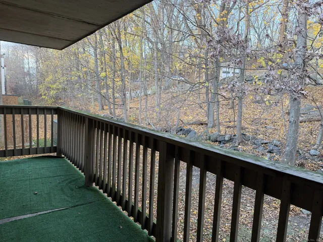 a view of a wooden fence