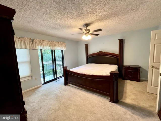 a view of balcony with wooden floor