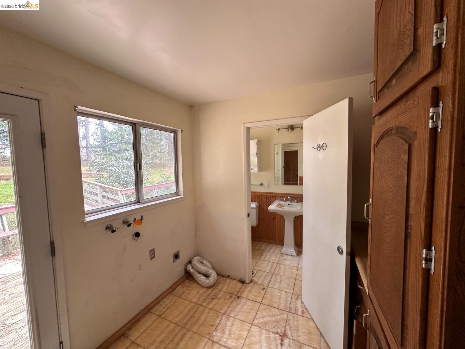 19071 West Allan Volcano, CA 95689 - Photo 14 of 42 a view of a hallway with wooden floor and windows
